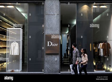 standing infront of dior store milan|dior milan.